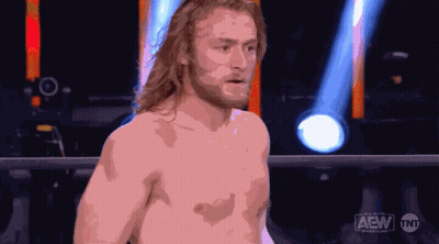Shirtless Wrestler In Ring With AEW Logo GIF
