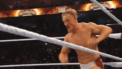 Shirtless Wrestler In Ring With Crowd GIF