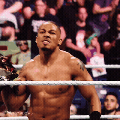 Shirtless Wrestler In Ring With Number 24 GIF