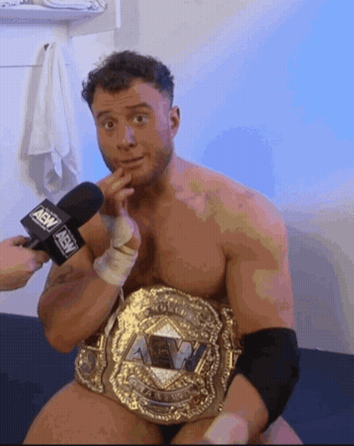 Shirtless Wrestler Interviewed With AEW Mic GIF