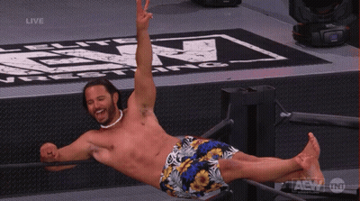 Shirtless Wrestler Lying On Back In Ring GIF