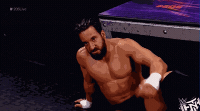 Shirtless Wrestler Sitting On Floor GIF
