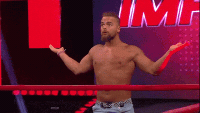 Shirtless Wrestler Standing In Ring GIF