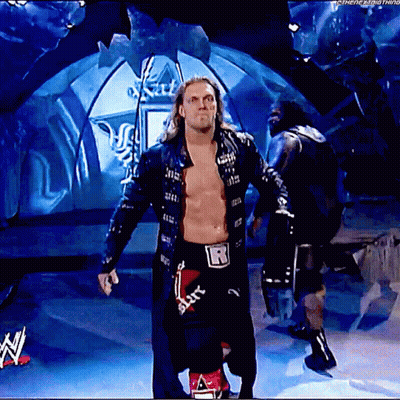 Shirtless Wrestler With Letter R On Belt On Stage GIF