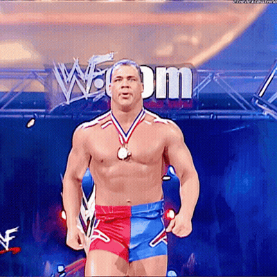 Shirtless Wrestler With Medal And W Dm Sign GIF