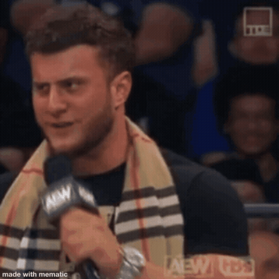Shirtless Wrestler With Scarf Tickets On Sale Sign GIF