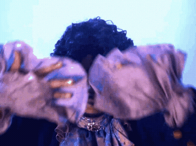 Shirtless Wrestler With Sunglasses And Necklace In Ring GIF
