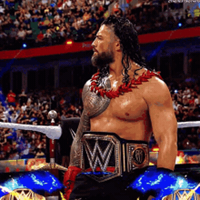 Shirtless Wrestler With W Belt In Ring GIF
