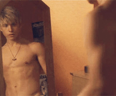 Shirtless Young Man Looking In Mirror GIF
