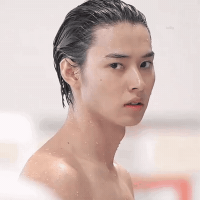 Shirtless Young Man With Wet Hair Looking At Camera GIF