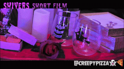 Shivers Short Film Poster Books And Wine Glasses GIF