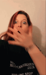 Shocked Face Covering Mouth GIF