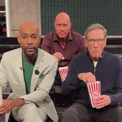 Shocked Maury Eating Popcorn GIF