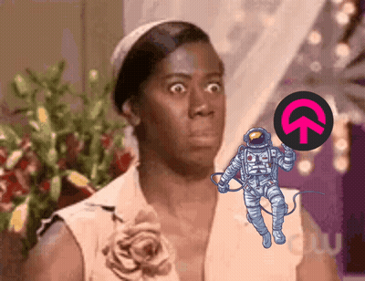 Shocked Woman Looking At Astronaut Holding Circle With Upward Arrow GIF