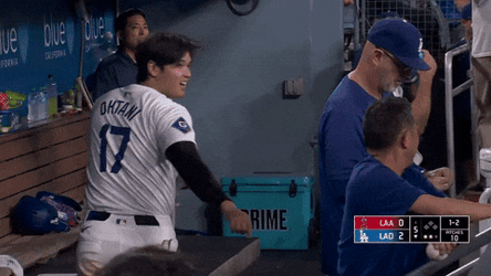 Shohei Ohtani Pointing At His Coach By The Bench GIF