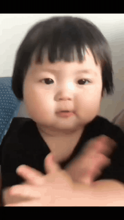 Short-Haired Baby Girl Clapping And Making A Face GIF
