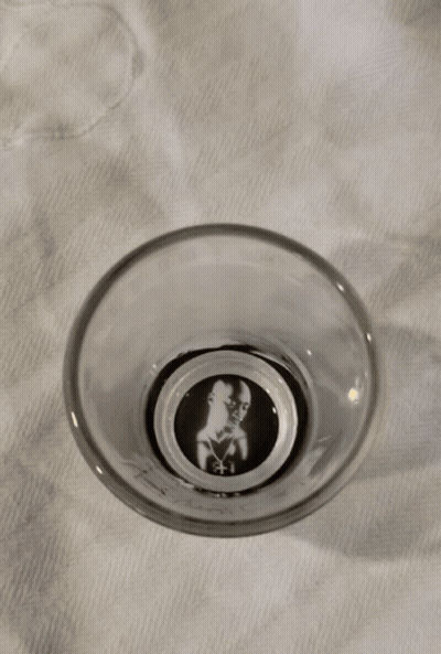 Shot Glass On Towel GIF