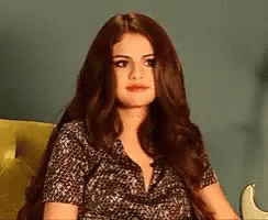 Shoulder Shrug Selena Gomez GIF