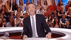 Show Presenter Holding Poop Emoji
