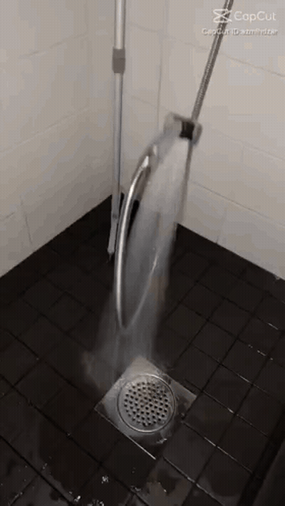 Shower Head Turned On With Water GIF