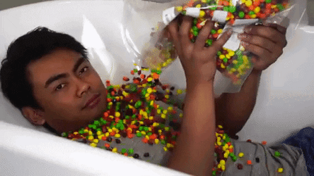 Shower Skittles Candy On The Tub GIF