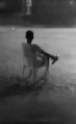 Showing Sadness Alone In Storm GIF