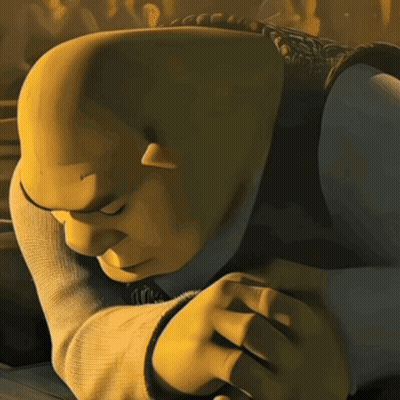 Shrek From Shrek Is Laying Down With His Head On His Hands GIF