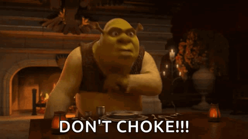 Shrek From Shrek Is Sitting At A Table Saying Do N't Choke !! GIF