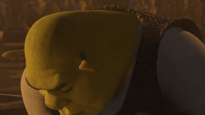 Shrek From The Animated Movie Shrek Looks At The Camera GIF