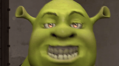 Shrek From The Movie Shrek Is Looking At The Camera With His Mouth Open GIF