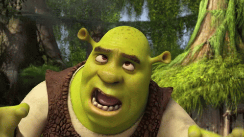 Shrek From The Movie Shrek Is Making A Funny Face With His Mouth Open GIF