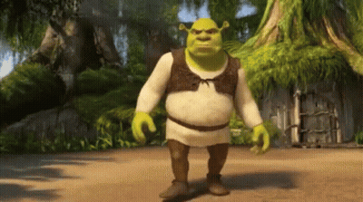 Shrek From The Movie Shrek Is Walking On A Dirt Path GIF