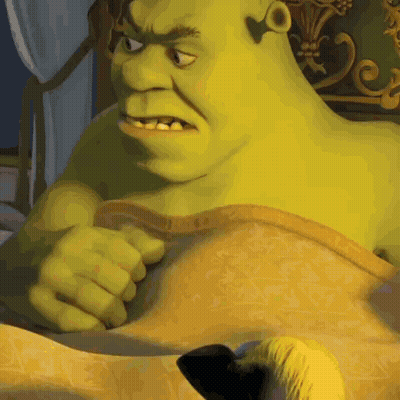 Shrek Laying In Bed With Blanket GIF