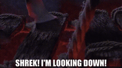 Shrek Looking Down From Behind Wooden Fence GIF