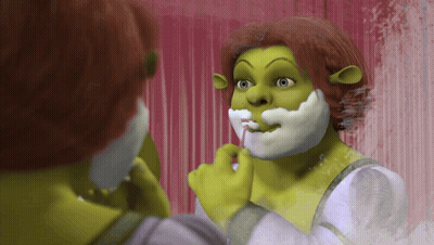 Shrek Shaving In Front Of Pink Curtain GIF