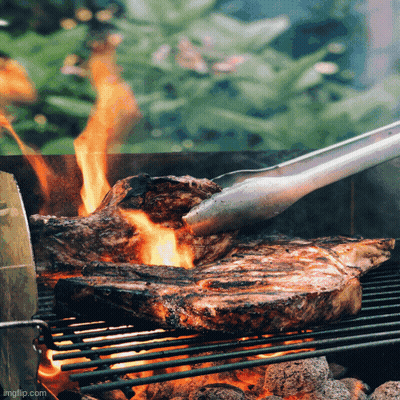 Shrimp And Meat Cooking On Grill With Vegetables GIF