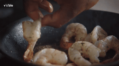 Shrimp Cooking in Frying Pan With V's Ble