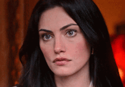 Shrugging Phoebe Tonkin GIF