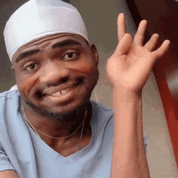 Shy Happy Guy Raising Hand GIF