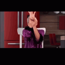 Sign Of The Cross Falling Off The Chair GIF