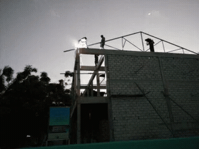 Sign On Building Saying Avenida GIF