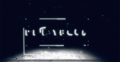 Sign Saying Playbuck In Dark Room GIF