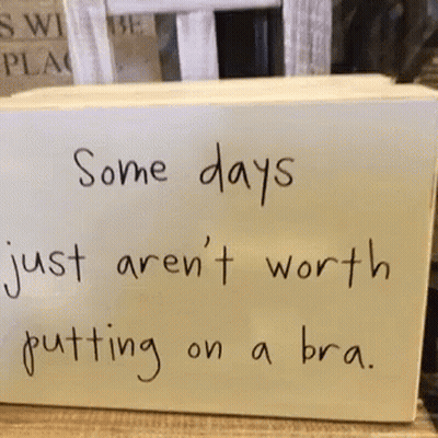 Sign Saying Some Days Just Aren't Worth Putting On A Bra GIF