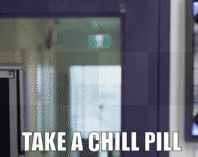 Sign Saying Take A Chill Pill In Front Of Window GIF
