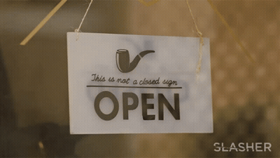 Sign Saying This Is Not A Closed Sign Is Open GIF