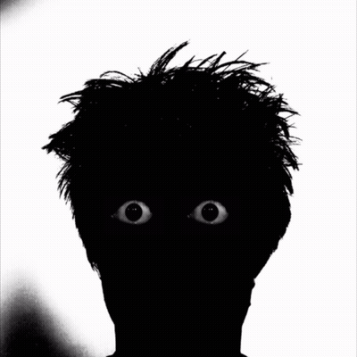 Silhouette Face With Glowing Eyes GIF
