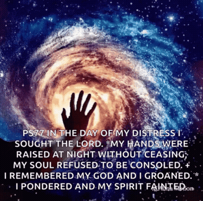 Silhouette Hand Reaching Toward Galaxy GIF