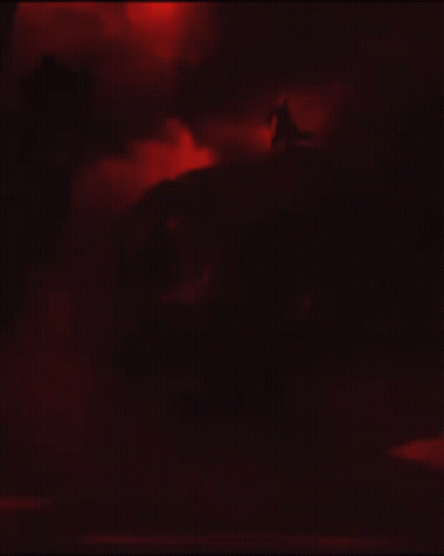 Silhouette Man Holding Sword With Lightning From Arm GIF
