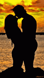 Silhouette Of Couple Passionate Kissing At Sunset