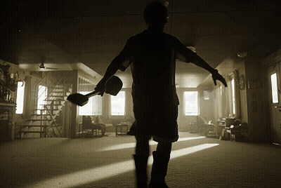 Silhouette Of Man Holding Shovel GIF